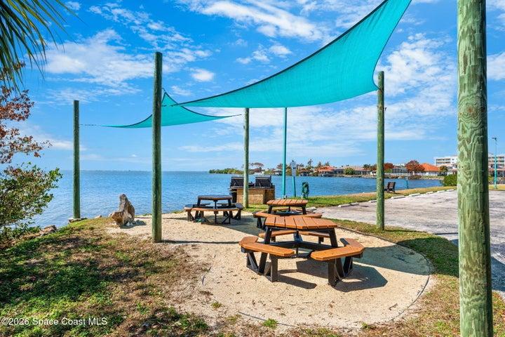 Outdoor barbecue area provides a convenient setting for cooking and gathering with neighbors.