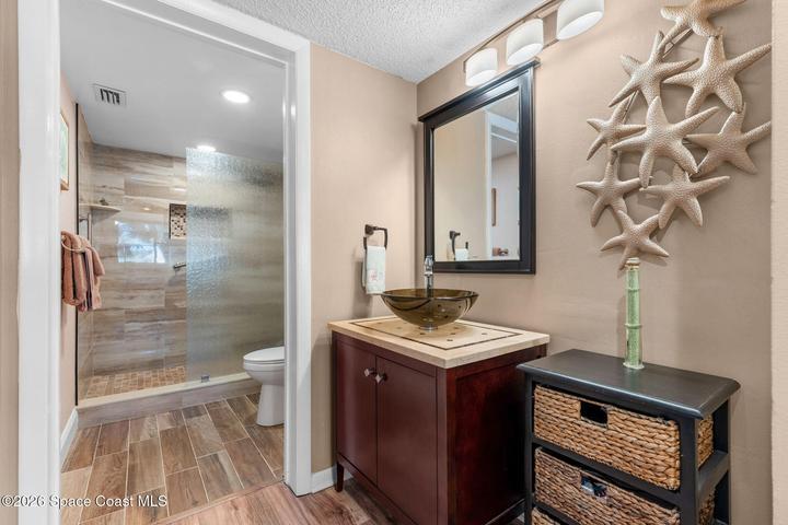 Private primary bathroom inside the two-bedroom waterfront condo at 300 Columbia Drive Unit 3204.