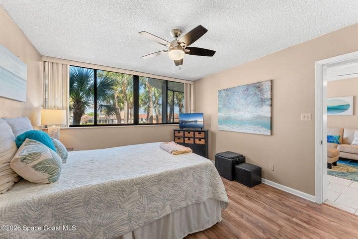 Primary bedroom at 300 Columbia Drive Unit 3204 with a walk-in closet and private bathroom.