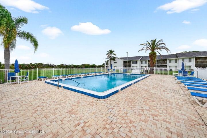 Enjoy a Nice Swim or Relax on a Lounge Chair Around the Sparkling Pool