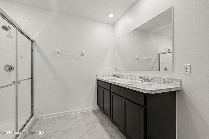 primary bathroom with large shower