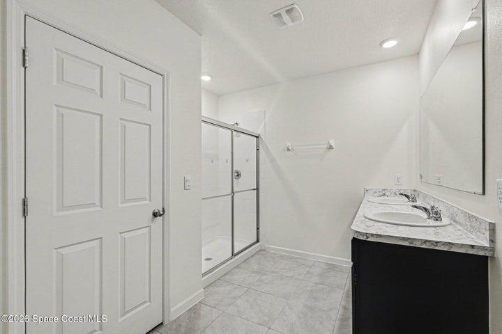 primary bathroom with large shower