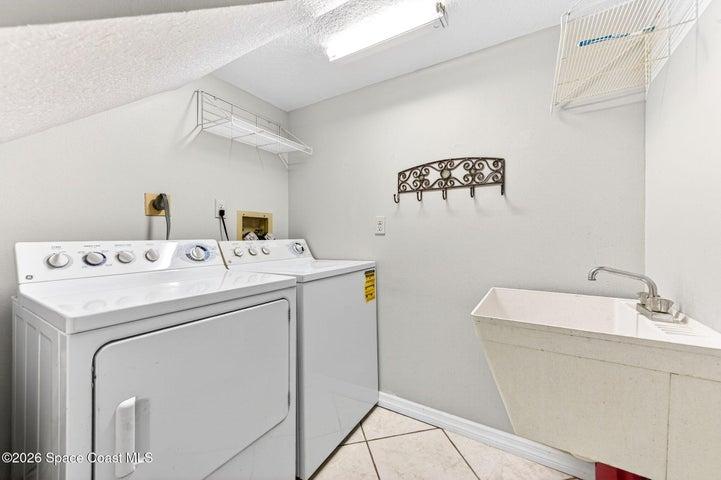 Lower level in unit laundry room