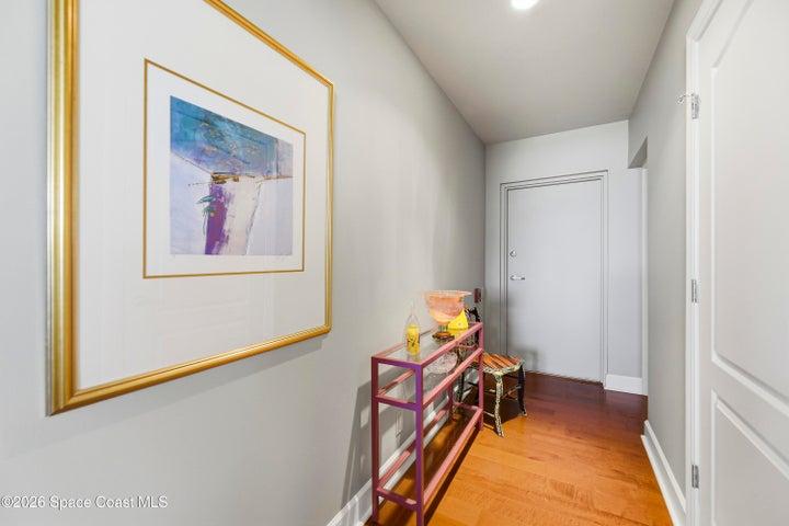 Hall to Half Bath and Stairwell