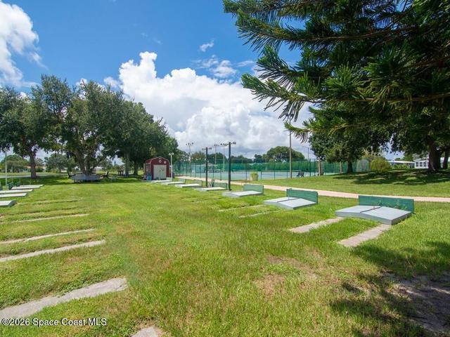 908 Oleander Circle, Barefoot Bay, FL, 32976 photo 31