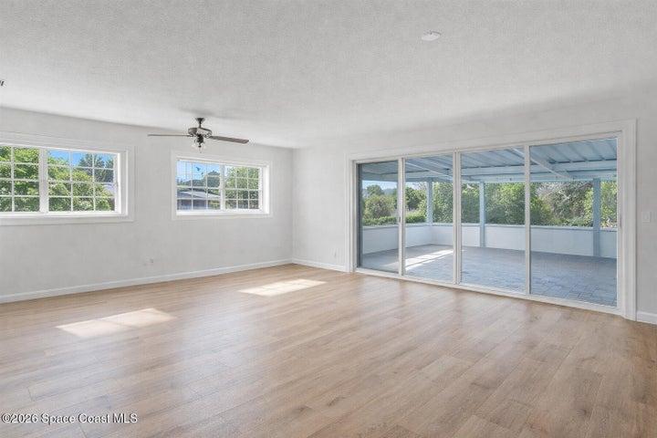 Open this wall to the sunroom with lake views