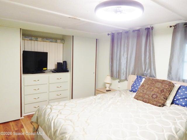 Master bedroom with half bath