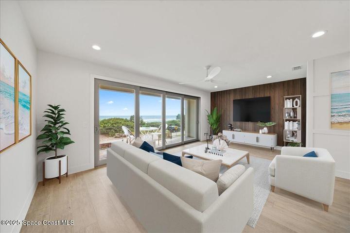 Enjoy ocean views from your second floor living room. Three living spaces, one on each floor.