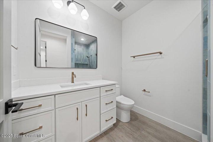 3 story, 4 bedrooms, 4 baths, 3 living rooms, 2 laundry rooms, private elevator + garage