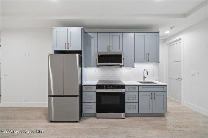 Secondary kitchen on 1st floor - this can be utilized as an apartment.