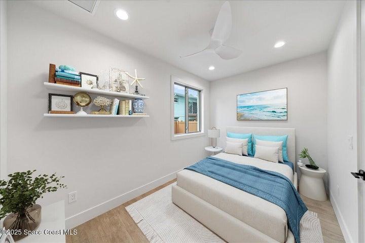 1st floor bedroom with adjacent bath.