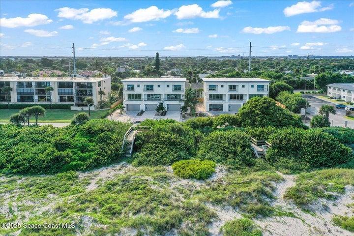 3 story, 4 bedrooms, 4 baths, 3 living rooms, 2 laundry rooms, private elevator + garage