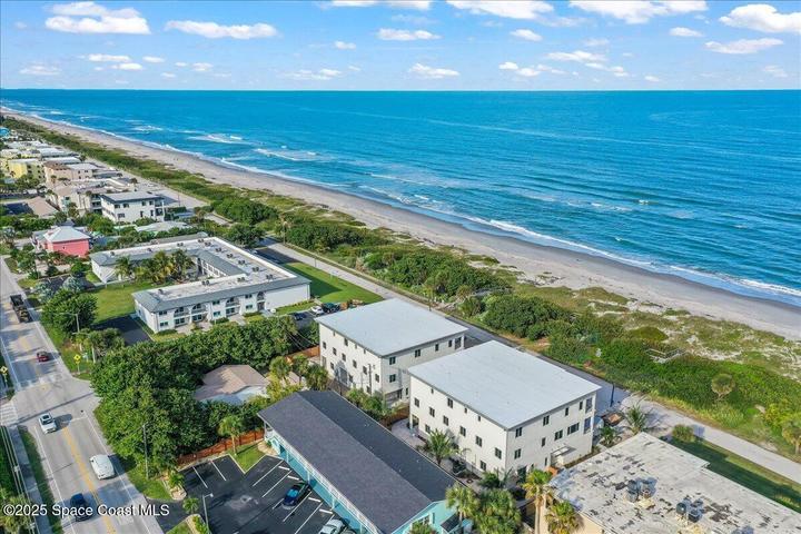 3 story, 4 bedrooms, 4 baths, 3 living rooms, 2 laundry rooms, private elevator + garage