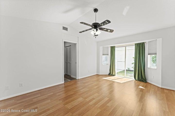 downstairs guest bedroom with walk in closet