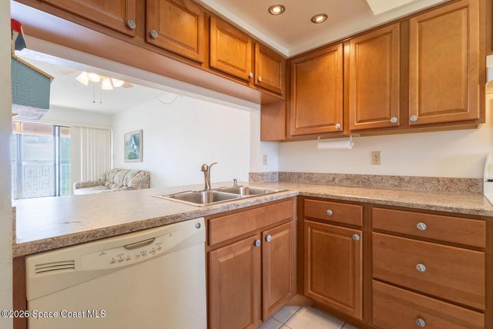 Kitchen overlooking Living Area and Porch Area with River Views and Space Center Views