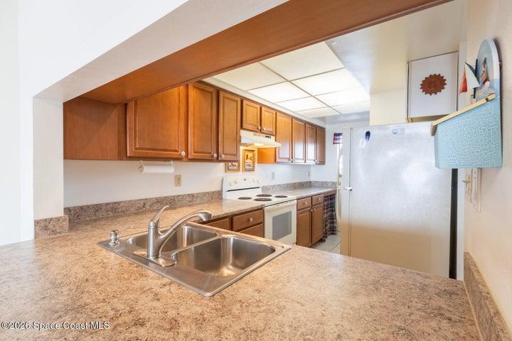 Looking back into Kitchen with so much storage!