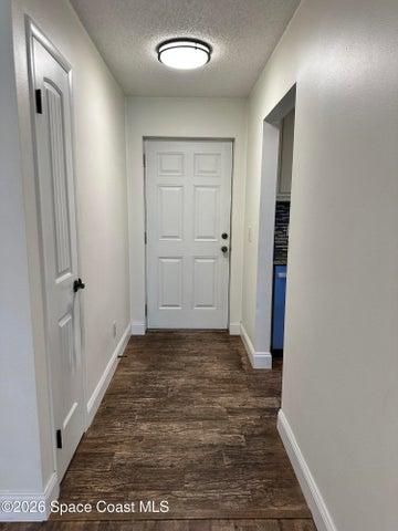 View of entrance hallway from dining room