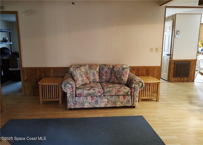 12 / 25 Parlor, or TV room is open to kitchen and Florida room
