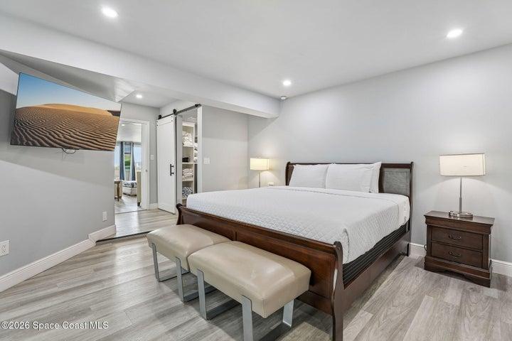 First floor bedroom 4 with ensuite bath. Access to kitchenette, half bath and game room.