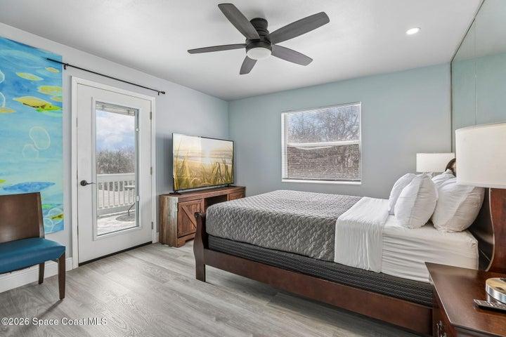 Second floor bedroom 6 with ensuite bath and access to private balcony