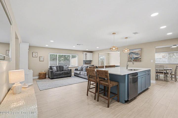 Kitchen Island with view of Living Room