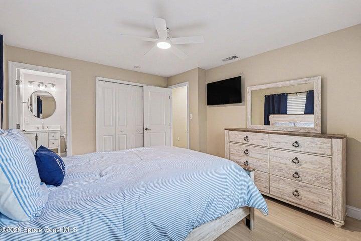 Primary Bedroom with view of bath