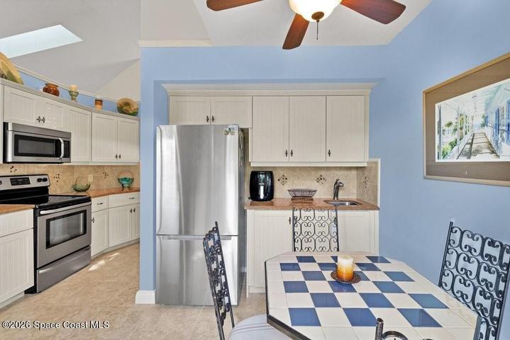 Breakfast nook includes a Coffee/Wet Bar to refill you favorite cup of coffee.