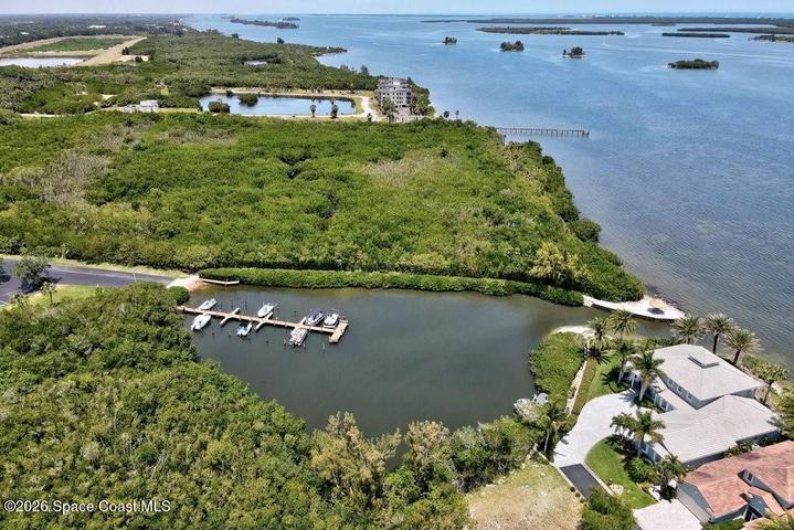 Pelican Pointe aerial of marina/boat ramp and protected lagoon.