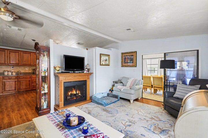 Cozy Living Room- Furntiture & Electric fireplace stays- Can even emit heat if choose to.