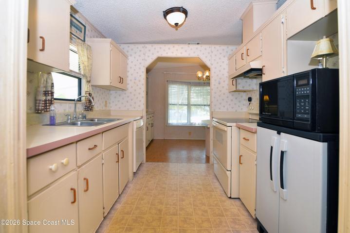 642 Periwinkle Circle, Barefoot Bay, FL, 32976 photo 5