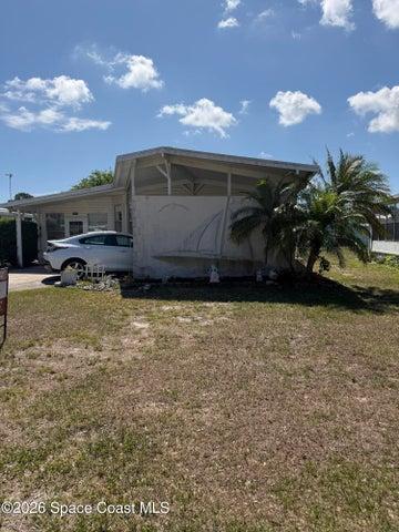 1025 Waterway Drive, Barefoot Bay, FL, 32976 photo 2