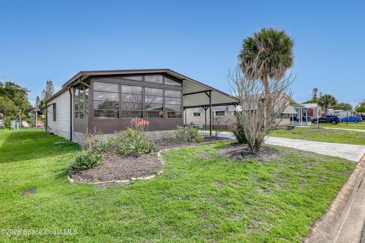949 Laurel Circle, Barefoot Bay, FL, 32976 photo 3