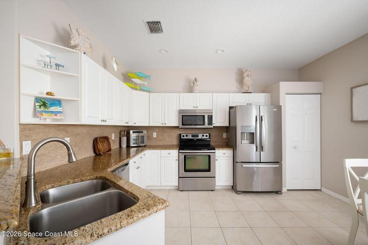 Additional view of kitchen features double bay sink
