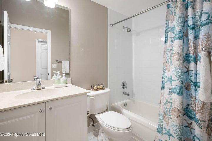 Primary bathroom features bath/shower combo