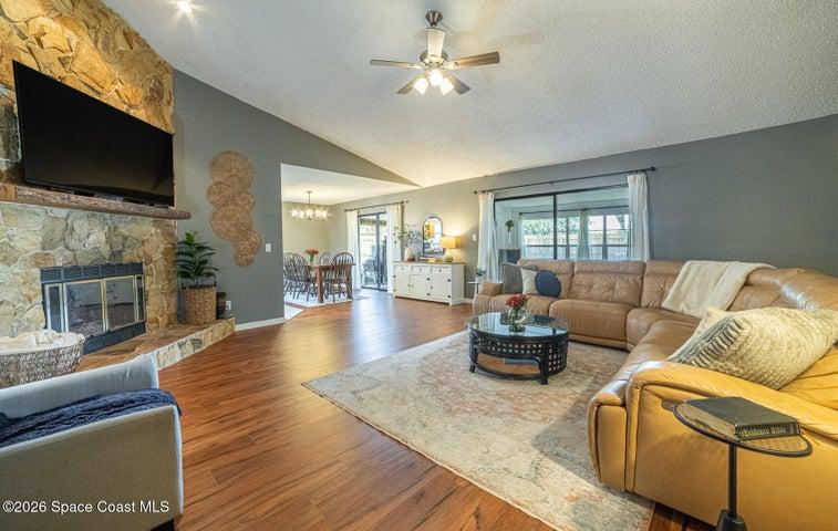 Featuring a cozy fireplace