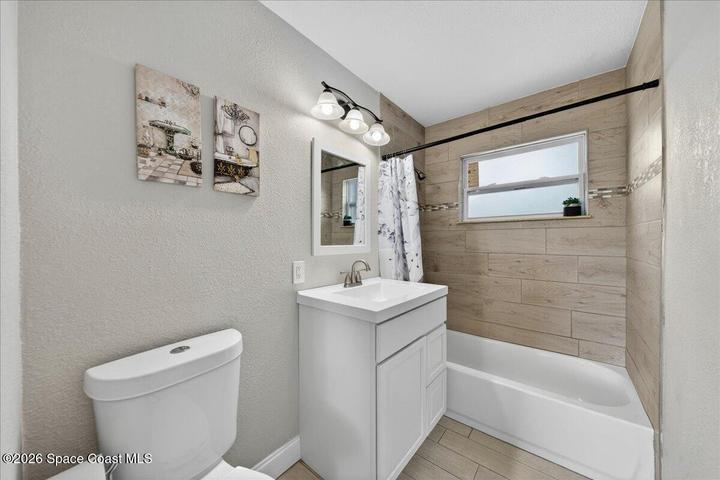 Bathroom with tub and shower