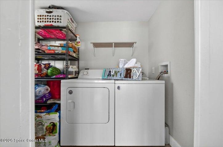 Laundry Room could easily convert to half bath with stackable washer and dryer