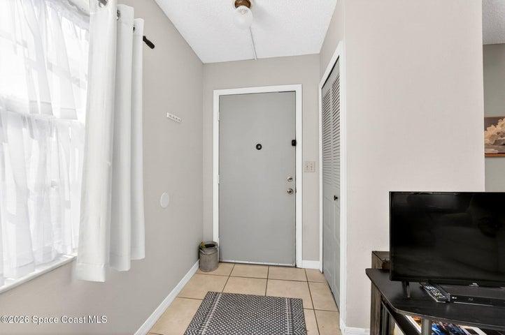 Entry way with storage closet