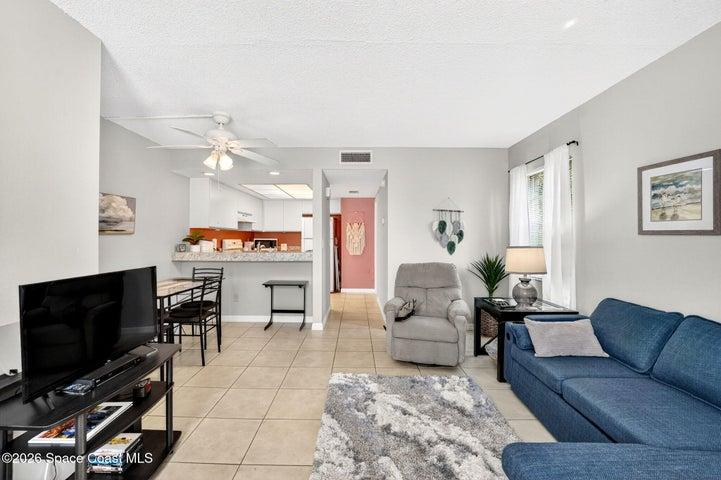 Living room, dining area and kitchen