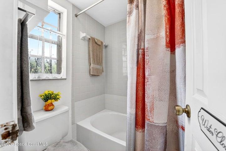 Tub with shower