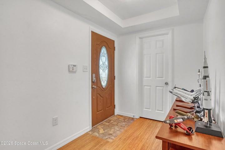 Front entrance foyer with closet.