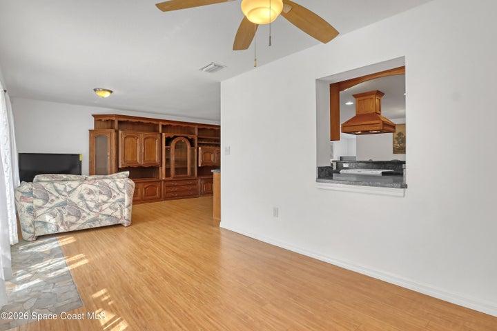 Window from kitchen to spacious Family room.