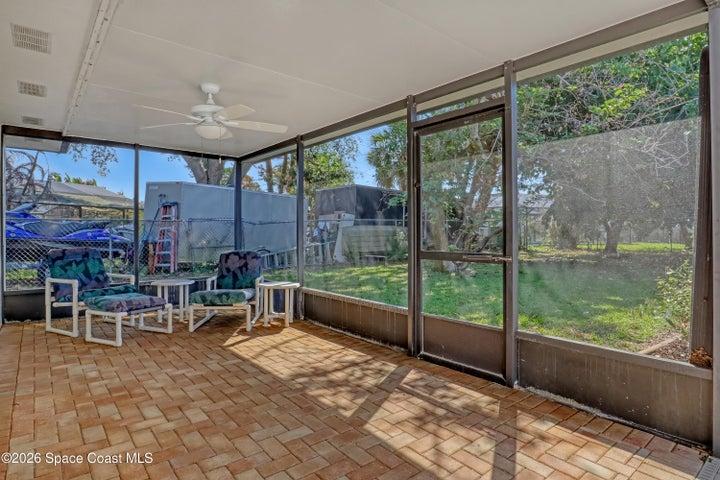 Shaded area for entertaining on large pool deck.