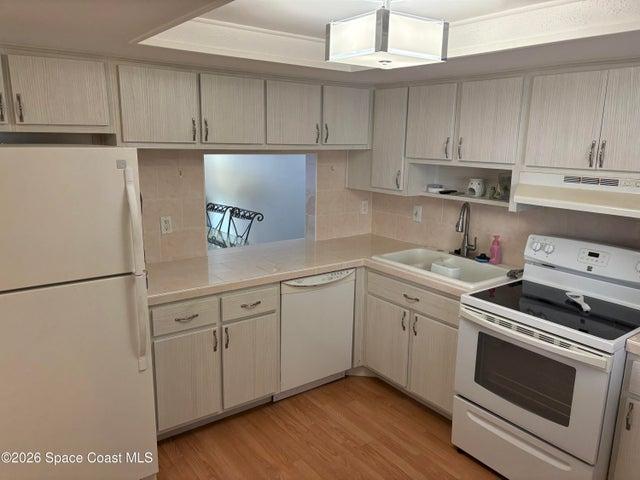 plenty of cabinets and counter top