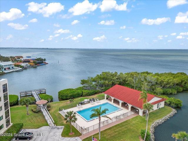 Costa Del Sol Heated Pool and Community Building with Riverfront