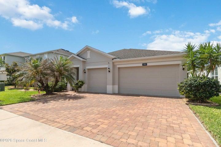 Paver driveway/walkway and a Sportsman 3-car garage welcomes you home