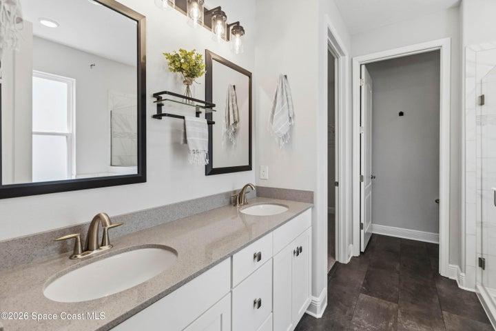 Primary ensuite bathroom with private water closet
