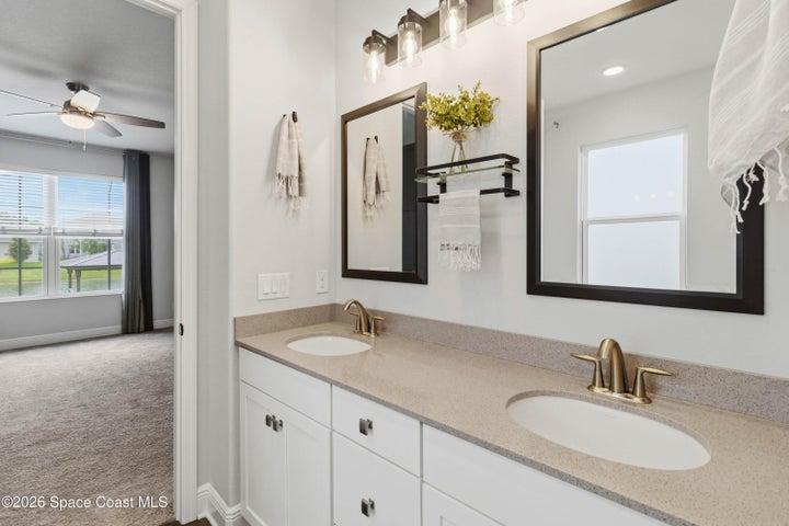 Tall countertop, dual sinks with quartz vanity top