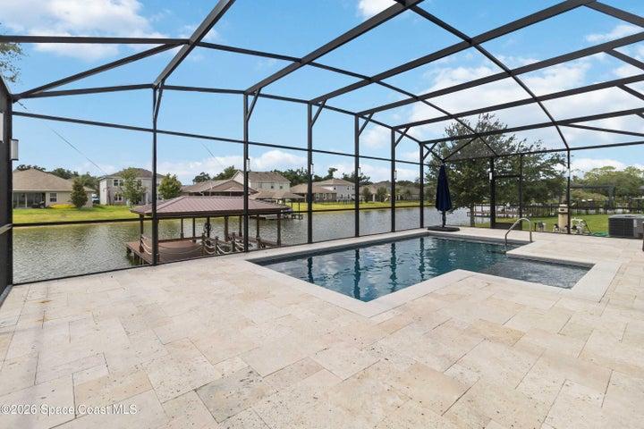 Beautiful view of the pool and private boathouse