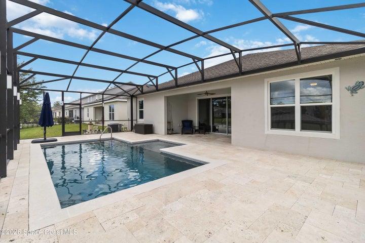 Extending decking with cooling travertine tile